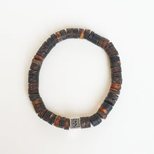 Load image into Gallery viewer, Bracelet with dark brown and black beads on a white background