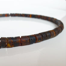 Load image into Gallery viewer, Brown amber beaded necklace on a white background