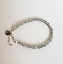 Load image into Gallery viewer, Beaded bracelet with a clasp on a white background